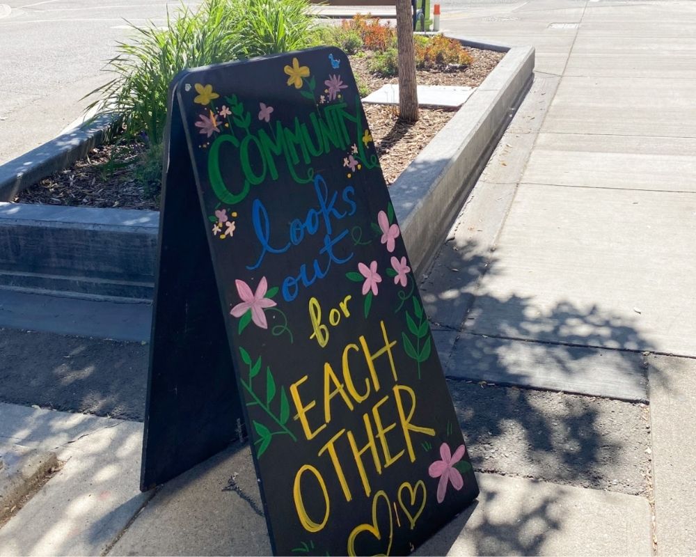local businesses building community sign